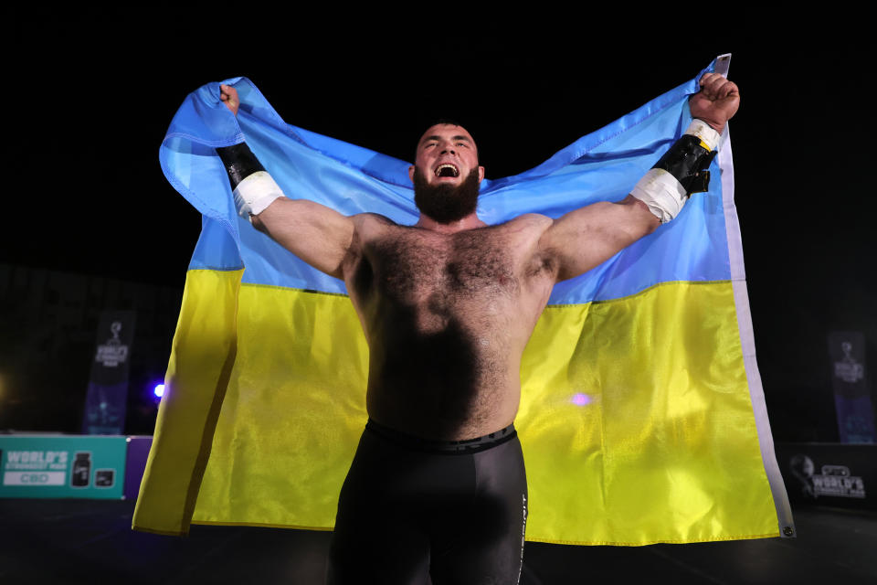 <div class="cell medium-auto caption">World’s Strongest Man winner Oleksii Novikov.</div> <div class="cell medium-shrink medium-text-right credit">Hector Vivas / World’s Strongest</div>