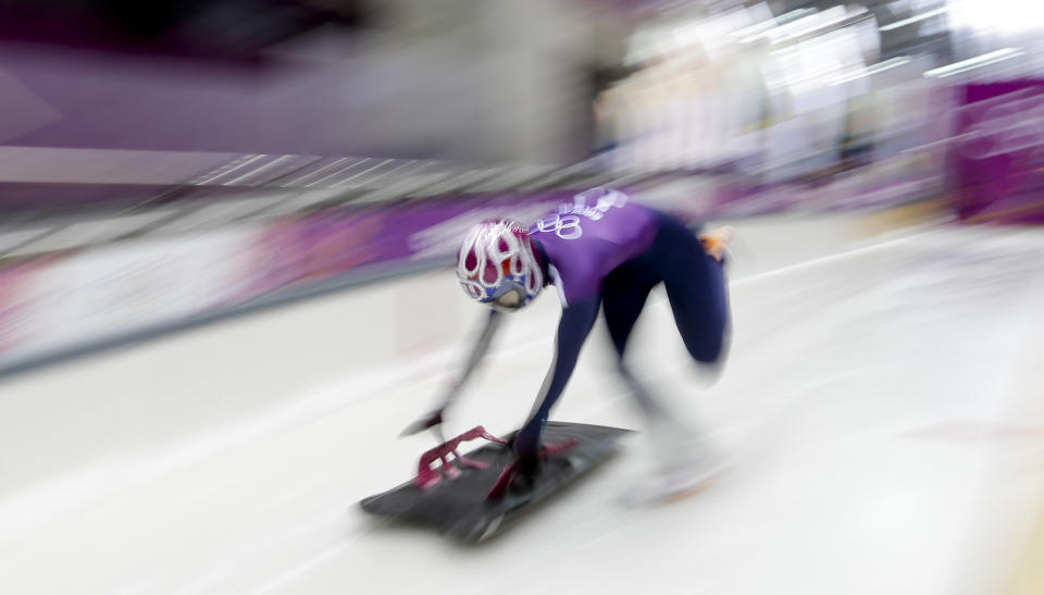 Noelle Pikus-Pace of the United States starts a training run for the women's skeleton during the 2014 Winter Olympics, Monday, Feb. 10, 2014, in Krasnaya Polyana, Russia. (AP Photo/Natacha Pisarenko)