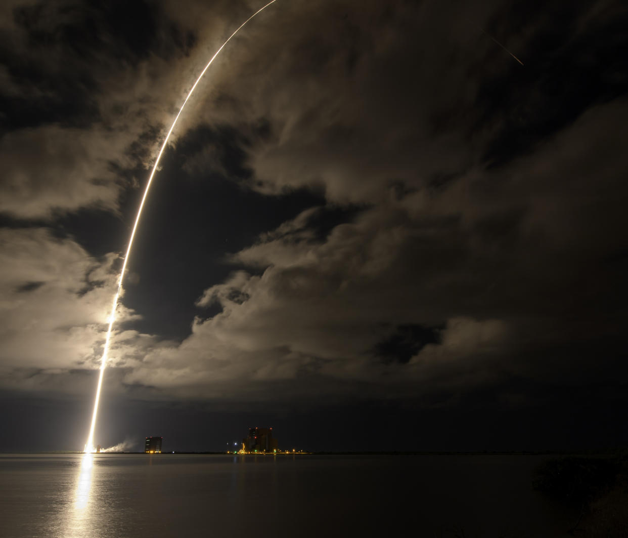 This photo released by NASA, shows a United Launch Alliance Atlas V rocket with the Lucy spacecraft aboard in this 2 minute and 30 second exposure photo as it launches from  Space Launch Complex 41, Saturday, Oct. 16, 2021, at Cape Canaveral Space Force Station in Florida. Lucy will be the first spacecraft to study Jupiter's Trojan Asteroids. Like the mission's namesake – the fossilized human ancestor, "Lucy," whose skeleton provided unique insight into humanity's evolution – Lucy will revolutionize our knowledge of planetary origins and the formation of the solar system. (Bill Ingalls/NASA via AP)