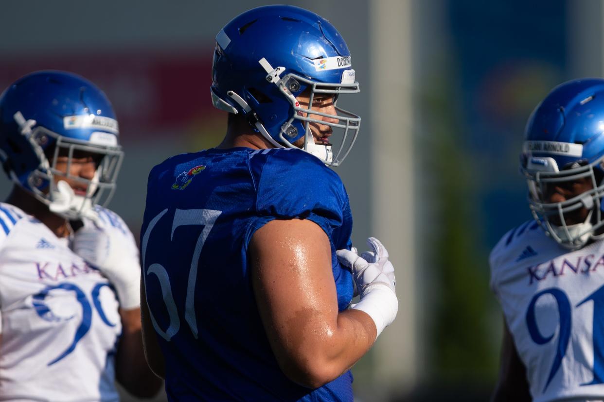 Kansas football offensive lineman Dominick Puni became one of the latest Jayhawks to be selected in the NFL draft this year.