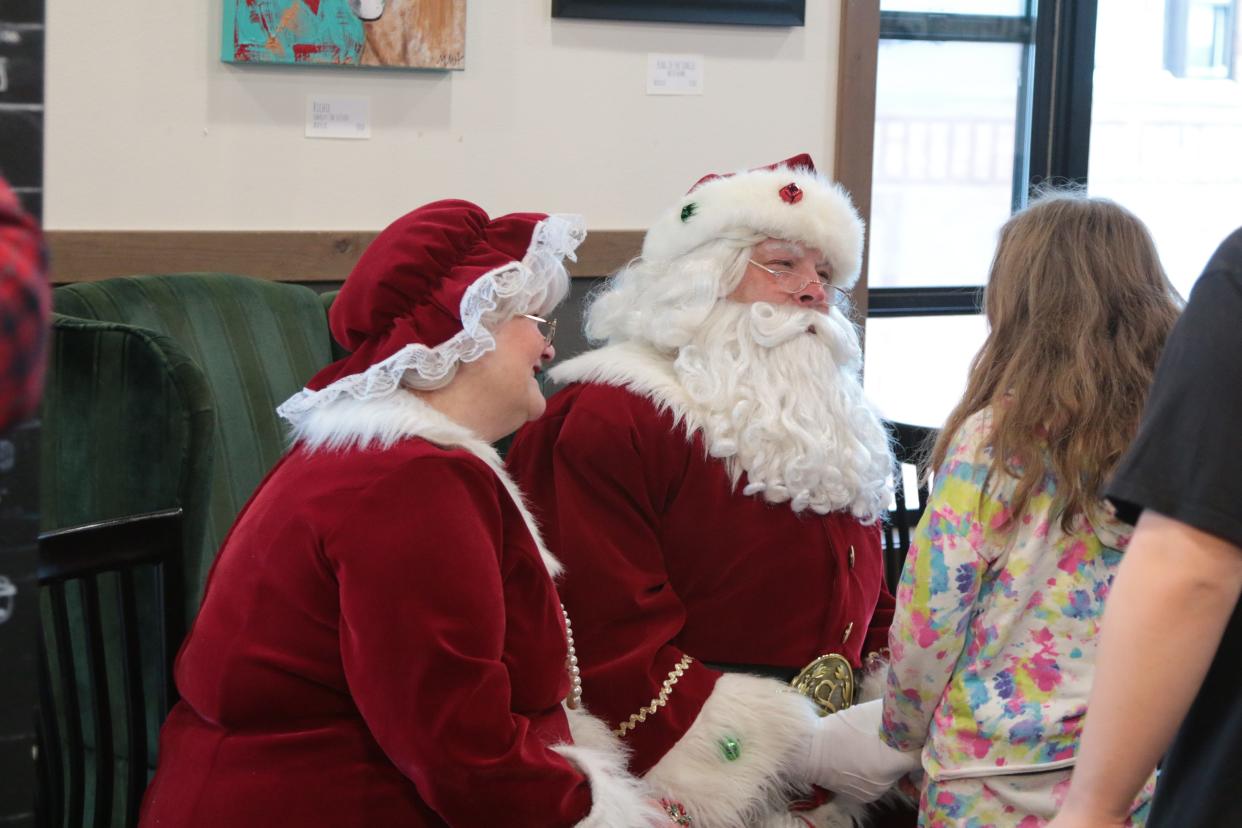 Children and parents gathered at Market on the Plaza for Mistletoe on Main where Santa and Mrs. Claus were available to visit with youth. Other featured guests included Ana and Elsa and Miss Aberdeen and Jr. Miss Aberdeen.