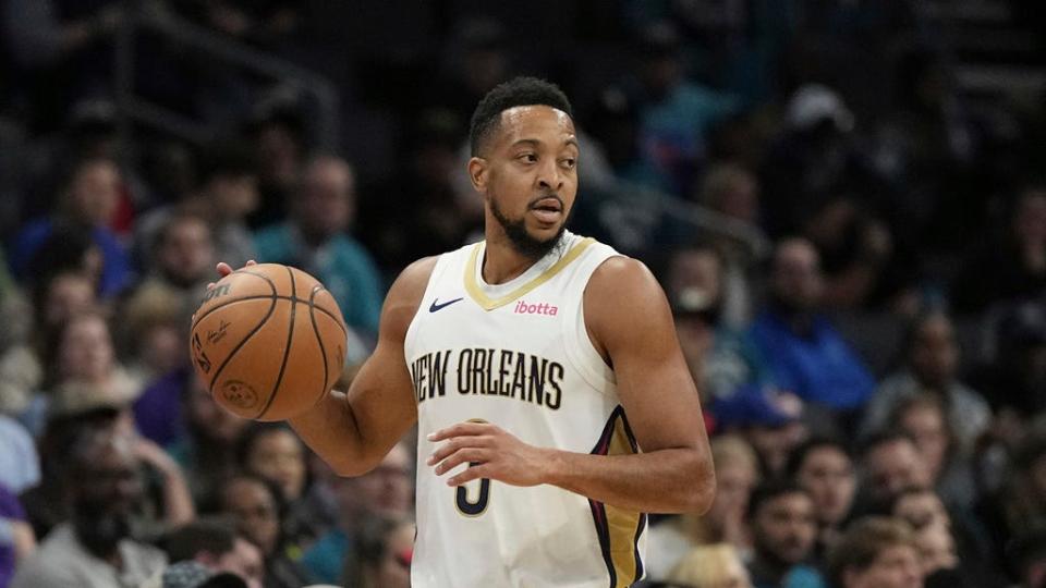 New Orleans Pelicans guard CJ McCollum brings the ball down court against the Charlotte Hornets on Dec. 15 in Charlotte, N.C.