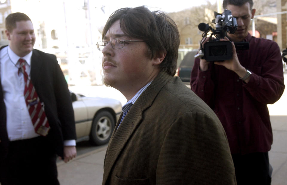 Mitchell Johnson, center, taking a break from trial in Fayetteville, Ark., Jan. 29, 2008. Johnson, then 23, faced one count of possessing of a firearm while being a user or being addicted to a controlled substance. (Photo: Beth Hall/AP)