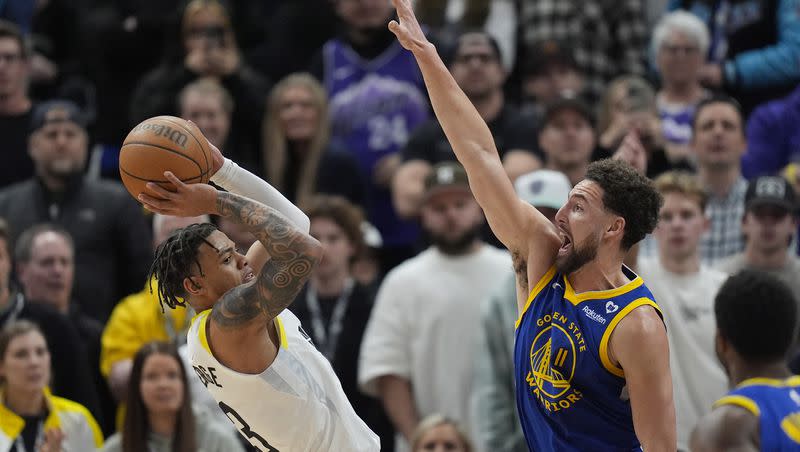 Golden State Warriors guard Klay Thompson defends against Jazz guard Keyonte George, left, during game Thursday, Feb. 15, 2024, in Salt Lake City.