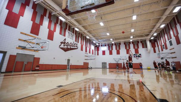 PHOTO: In this July 21, 2020, file photo, a New Mexico State player shoots a three at a pre-season practice for the NMSU men's basketball team in Las Cruces, N.M. (Nathan J Fish/Sun-News, Las Cruces Sun-News via USA Today Network, FILE)