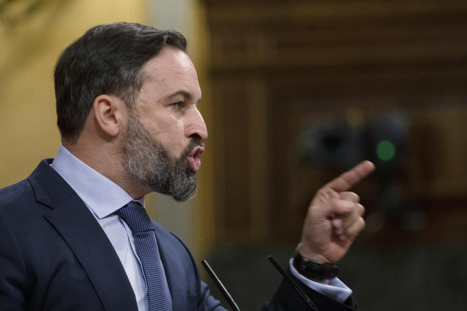 Vox party leader Santiago Abascal points while giving a speech during a parliamentary session in Madrid, Spain, Thursday Oct. 22, 2020. Spanish Prime Minister Pedro Sanchez is facing a no-confidence vote in parliament brought by the nation's far-right Vox party. (Pablo Blazquez Dominguez/Pool via AP)