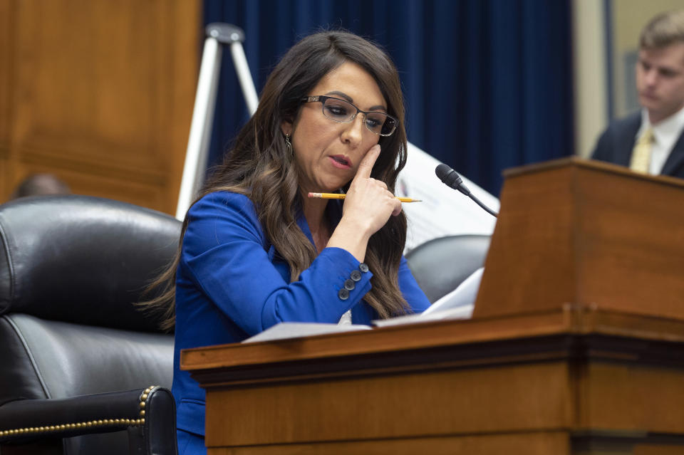 Rep. Lauren Boebert, R-Colo., listens to witnesses during the House Oversight and Accountability Committee's hearing about Congressional oversight of Washington, D.C., on Capitol Hill in Washington, Wednesday, March 29, 2023. (AP Photo/Cliff Owen)