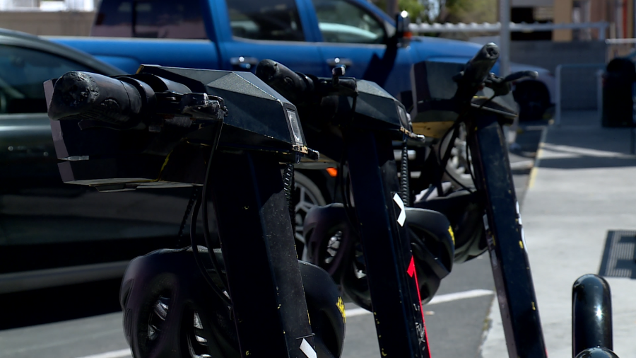 <em>Some of the Go X scooters waiting for riders in Downtown Las Vegas on Thursday. (KLAS)</em>