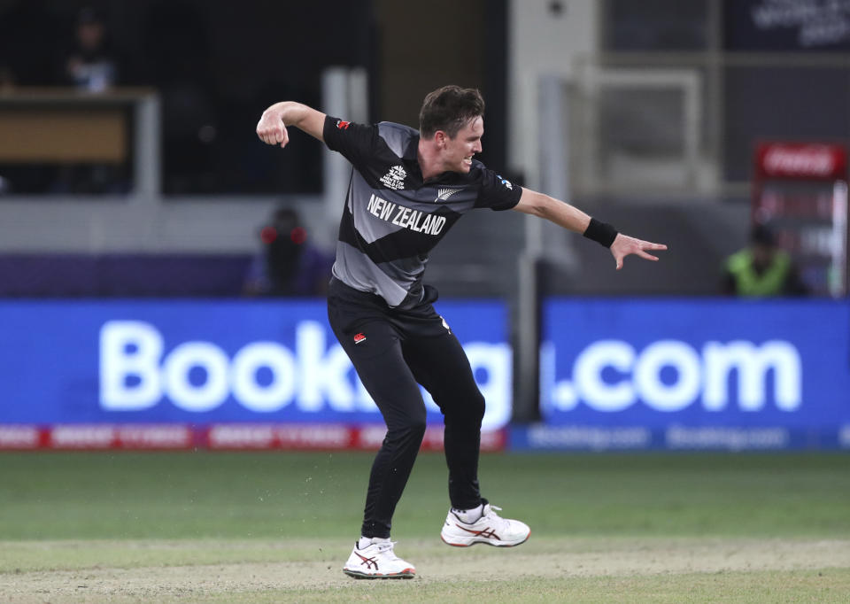 New Zealand's Adam Milne, celebrates the wicket of India's Rishabh Pant during the Cricket Twenty20 World Cup match between New Zealand and India in Dubai, UAE, Sunday, Oct. 31, 2021. (AP Photo/Aijaz Rahi)