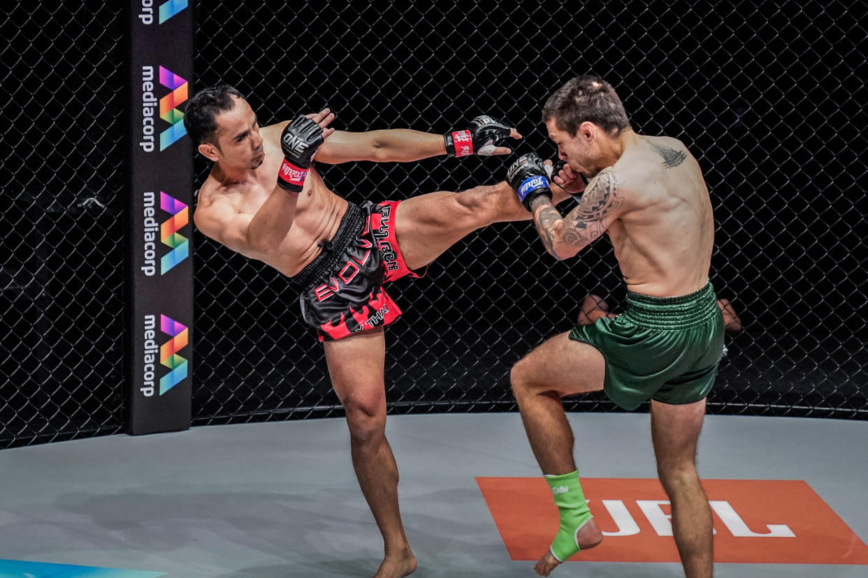 ONE Championship's men's strawweight champion Sam-A Gaiyanghadao (left) battles Australias Josh Tonna during the "Reign of Dynasties" closed-door event on 9 October 2020. (PHOTO: ONE Championship)