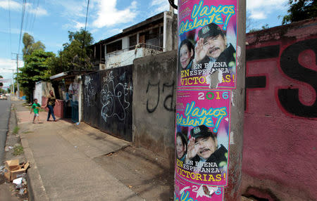 Posters of Nicaragua's President Daniel Ortega and vice presidential candidate first lady Rosario Murillo are seen in Managua, Nicaragua September 19, 2016. REUTERS/Oswaldo Rivas