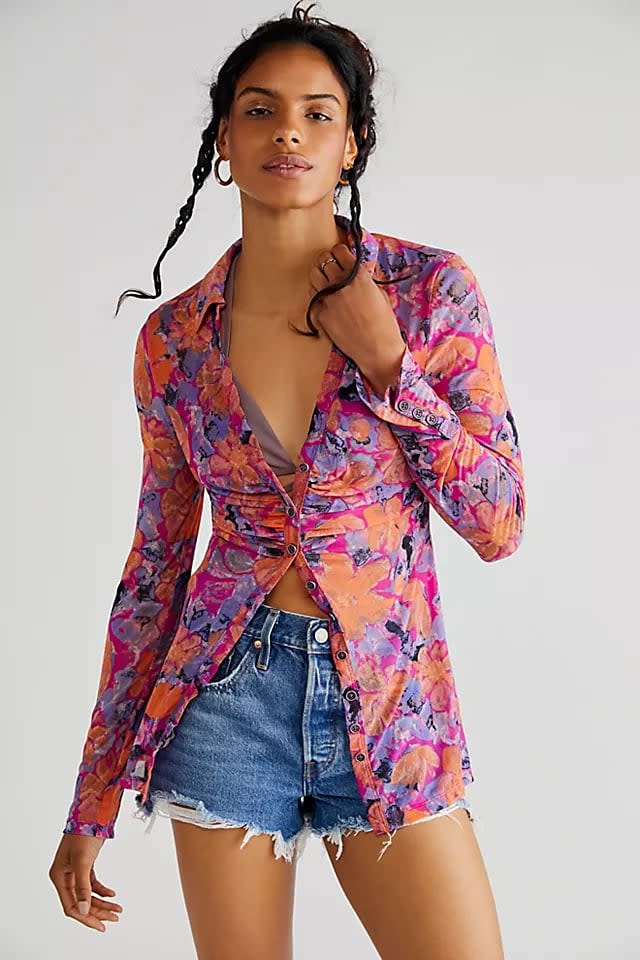 <p>A colorful button-down top is a great option to pair with jean shorts. This <span>Free People Lucky Shirtee</span> ($68) is slightly ruched and can be tied at the waist as well. We like this colorful style, but there are lots of other patterns to choose from.</p>