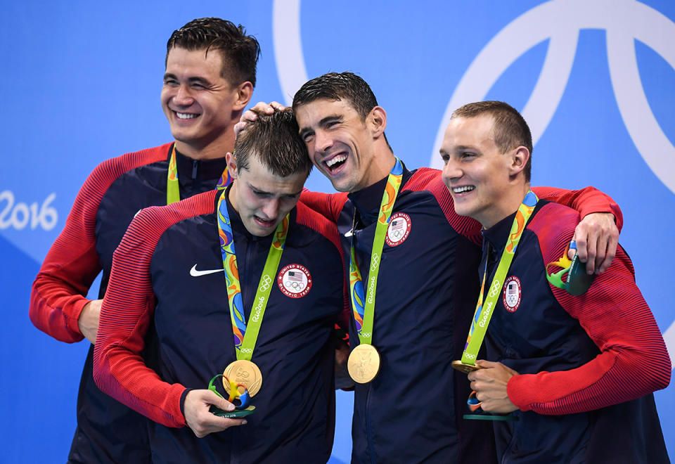 <p>From left, Nathan Adrian, Ryan Held, Michael Phelps and Caeleb Dressel with their gold medals after they won the Men’s 4 x 100m Freestyle Relay at the Olympic Aquatic Stadium on August 7, 2016. via Getty Images) </p>