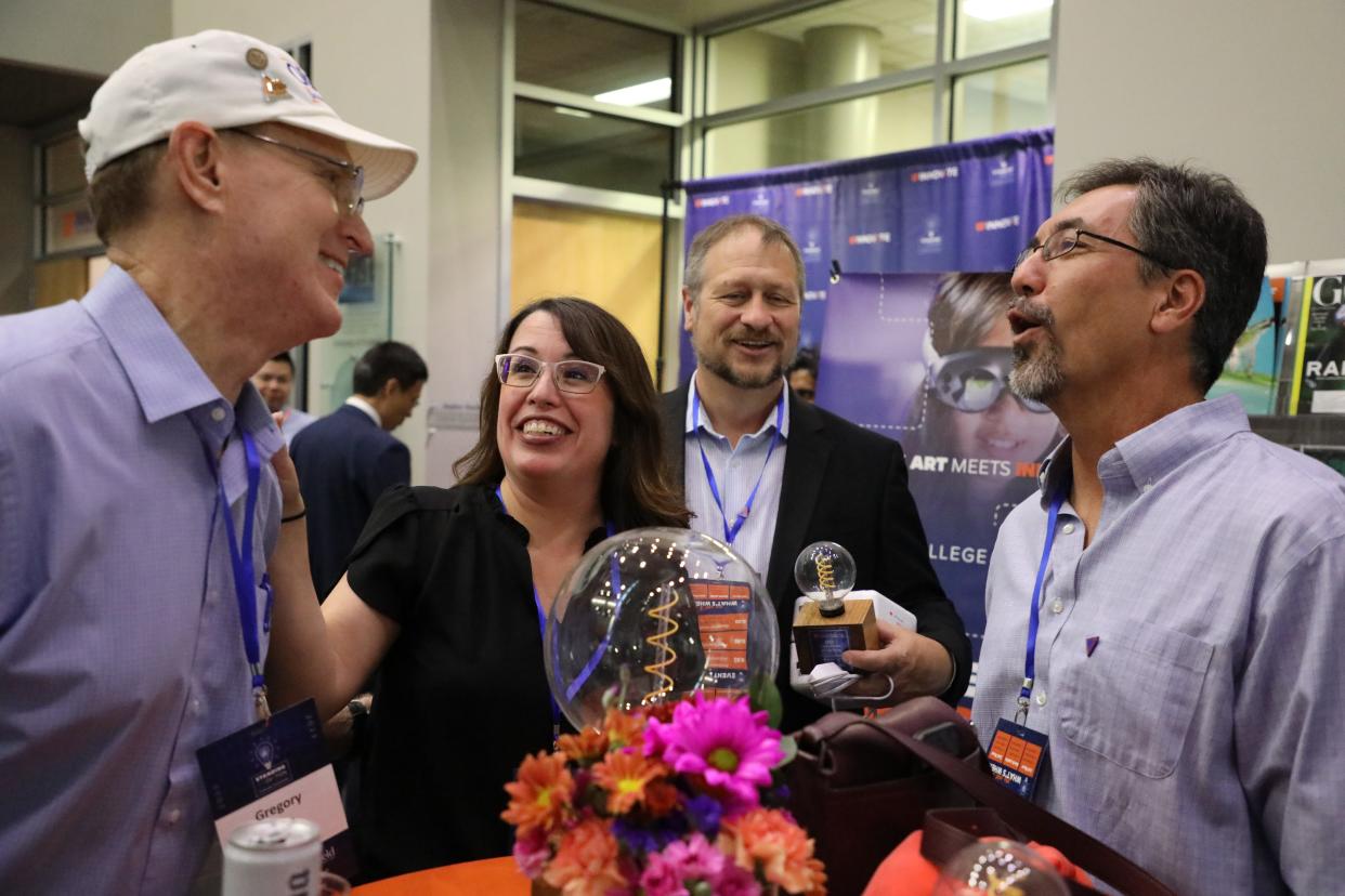 Shannon Boye, named Inventor of the Year, mingles with other inventors at the Standing InnOvation event on Wednesday, Oct. 18, 2023, held at the UF Innovate Hub.