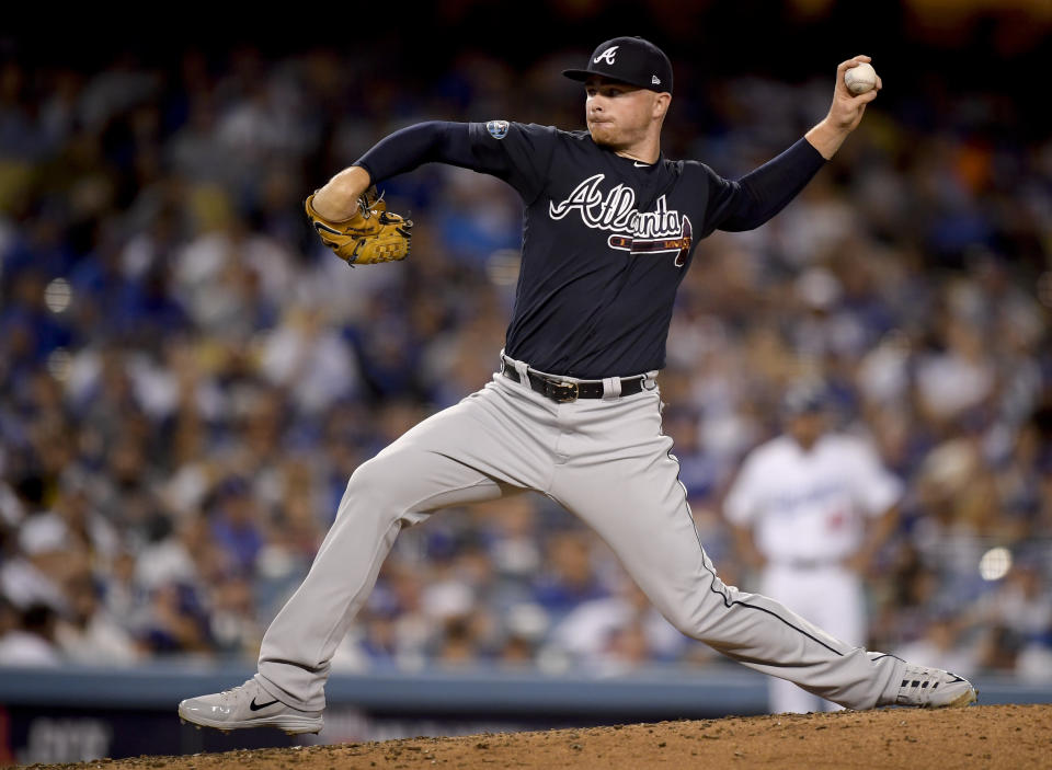 Atlanta Braves pitcher Sean Newcomb throws to a Los Angeles Dodgers batter during the third inning of Game 1 of a baseball National League Division Series on Thursday, Oct. 4, 2018, in Los Angeles. (AP Photo/Mark J. Terrill)