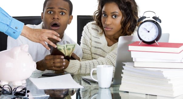 young couple trying to save their piggy bank