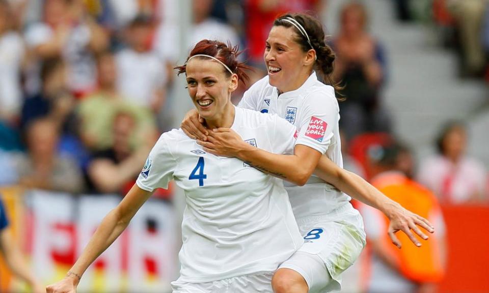 Jill Scott with Fara Williams, the only player with more England caps, after scoring at the 2011 World Cup.