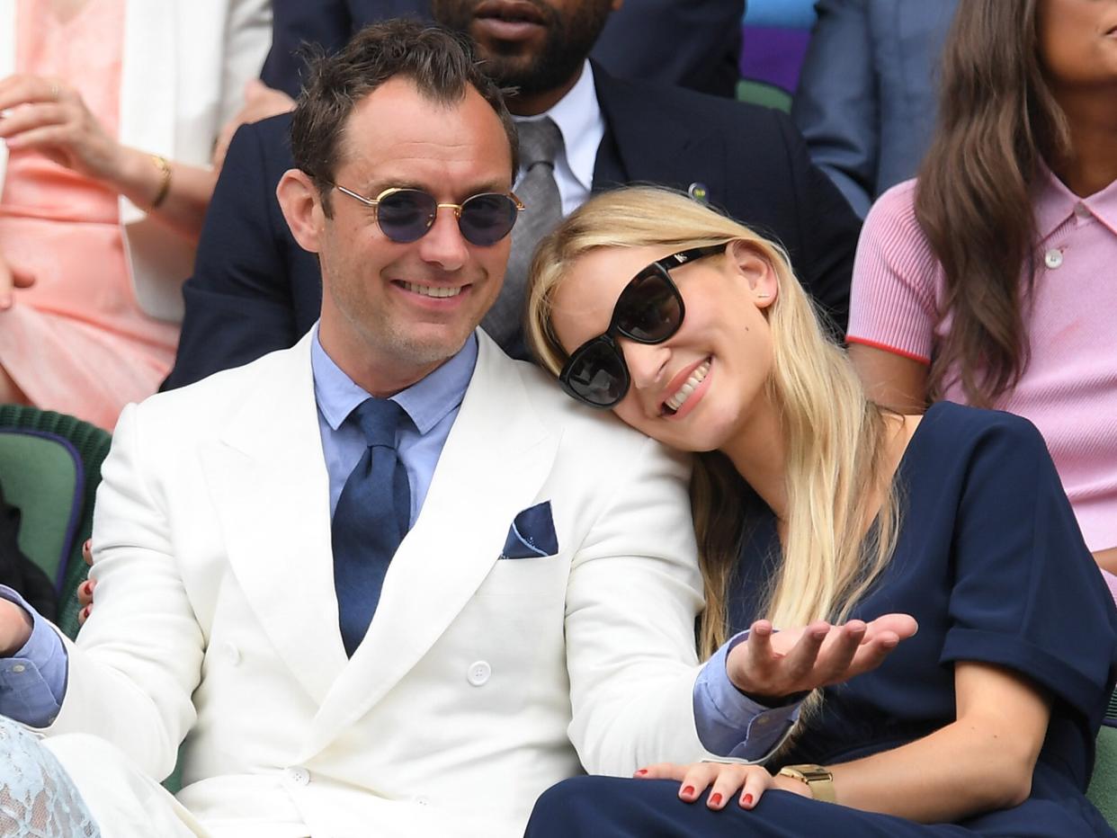 Jude Law and Phillipa Coan attend day eleven of the Wimbledon Tennis Championships at Wimbledon on July 08, 2016 in London, England