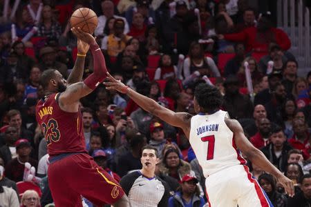 Nov 20, 2017; Detroit, MI, USA; Cleveland Cavaliers forward LeBron James (23) shoots over Detroit Pistons forward Stanley Johnson (7) in the second half at Little Caesars Arena. Rick Osentoski-USA TODAY Sports