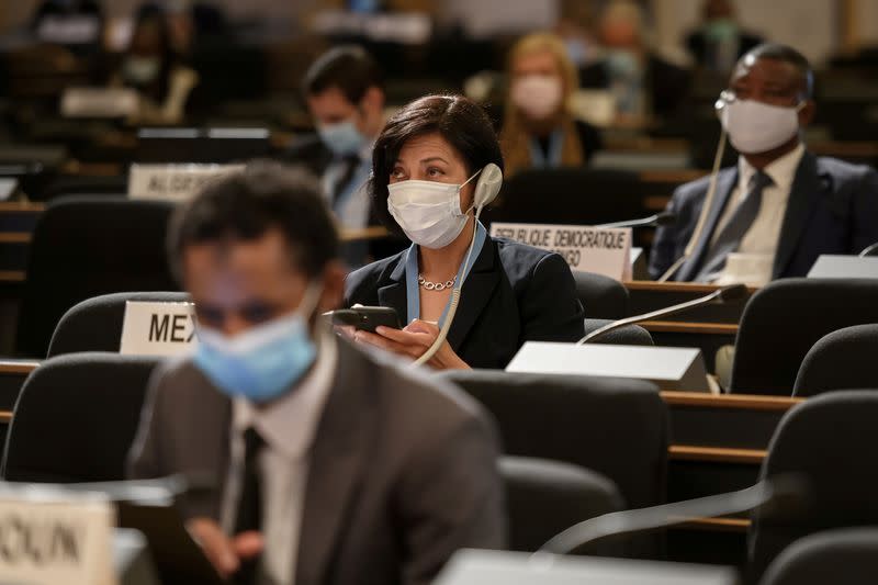 Delegates attend the resuming of a UN Human Rights Council session in Geneva