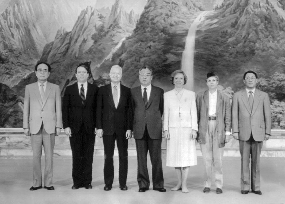 Then North Korean leader Kim Il Sung, center, poses a photo with former U.S. President Jimmy Carter, third from left, his wife Rosalynn Carter, third from right, and other members who visited North Korea, in this photo dated June 16, 1994.