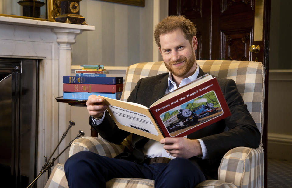 In this January, 2020 photo and made available on Monday April 27, 2020 by Mattel, Britain's Prince Harry poses for a photo during the recording of his introduction to the new animated special 'Thomas & Friends: The Royal Engine'. Set when the the Prince Harry's father, Prince Charles was a boy, Thomas has to take Sir Topham Hatt, the controller of the railway, to Buckingham Palace to receive an honour. The special will be screened in the US on Netflix on 1 May, 2020 and in the UK on Channel 5 Milkshake at 9:05 am on 2 May, 2020. (Dave Poultney/Mattel via AP)