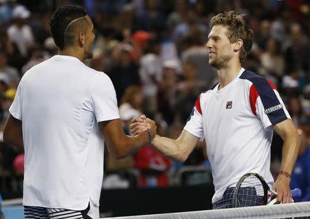 Tennis - Australian Open - Melbourne Park, Melbourne, Australia - 18/1/17 Italy's Andreas Seppi shakes hands with Australia's Nick Kyrgios after winning their Men's singles second round match. REUTERS/Issei Kato