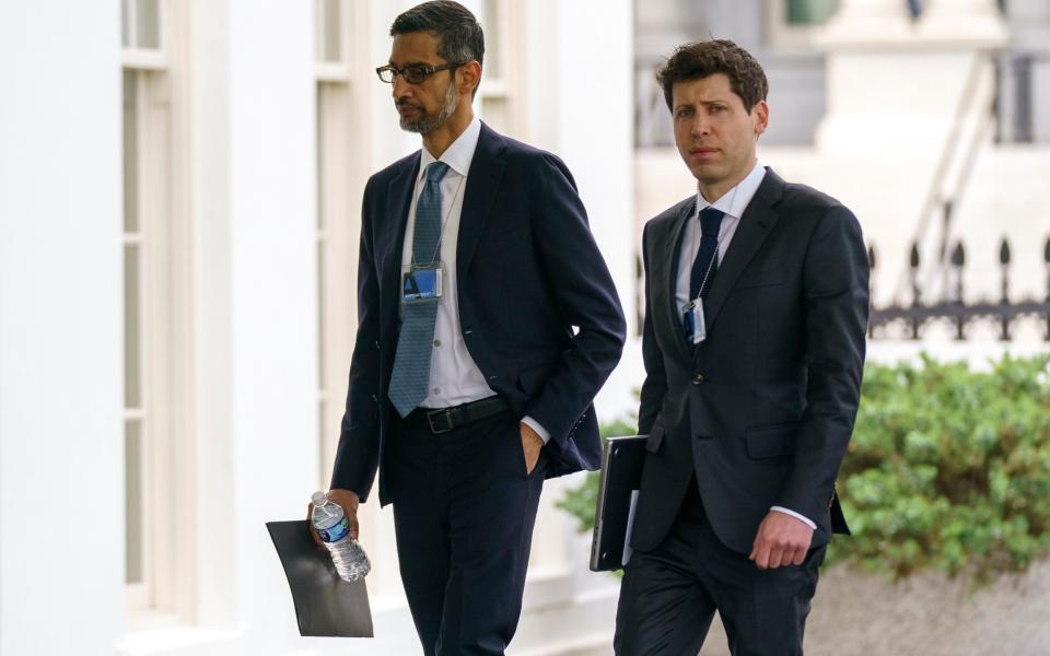 Alphabet&#39;s Sundar Pichai, left, and OpenAI&#39;s Sam Altman arrive to the White House for a meeting with Vice President Kamala Harris on artificial intelligence - AP Photo/Evan Vucc