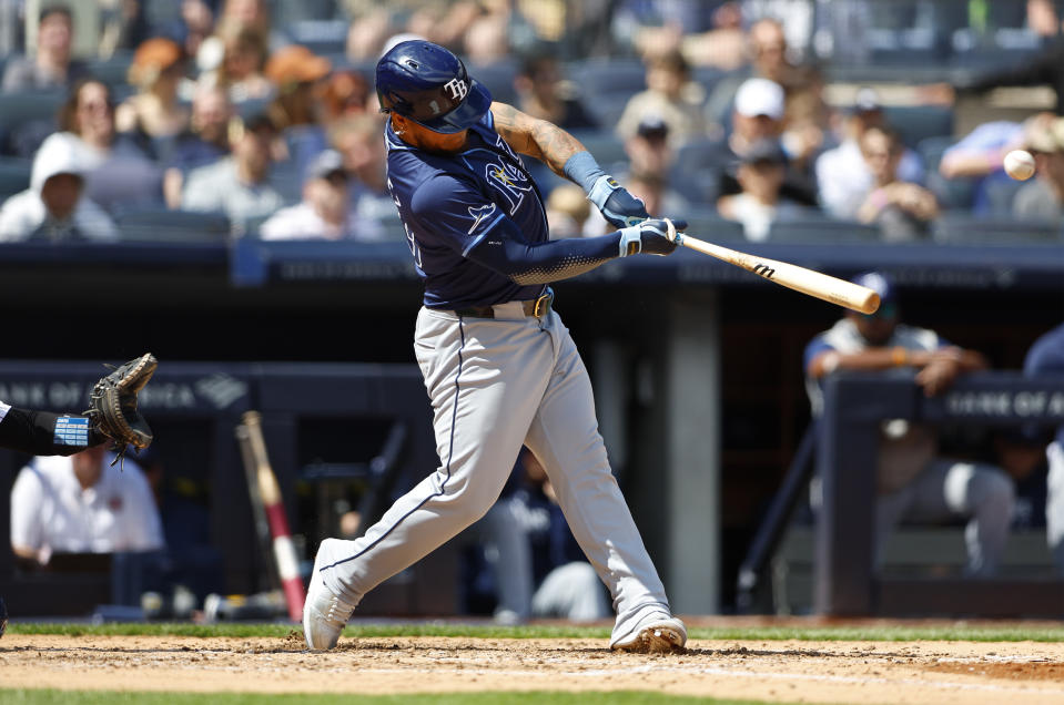 Tampa Bay Rays' Harold Ramírez (43) hits a single during the sixth inning inning of a baseball game against the New York Yankees, Saturday, April 20, 2024 in New York. (AP Photo/Noah K. Murray)