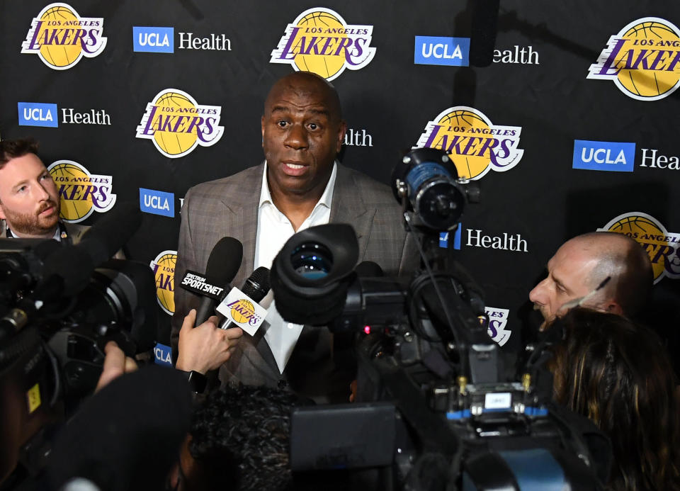 Magic Johnson speaks to the press about resigning as the Lakers' president of basketball operations Tuesday night. (Getty)