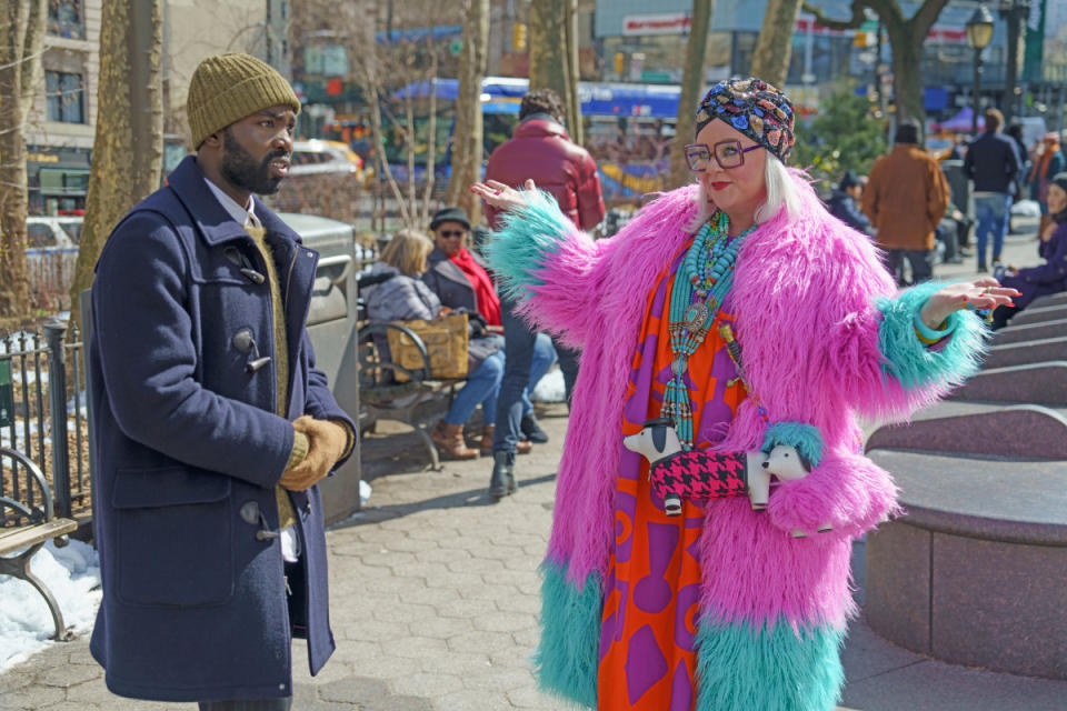 Paapa Kwakye Essiedu as Bernard Bottle and Melissa McCarthy as Flora in the Christmas movie "Genie"<p>NBCUniversal/Peacock</p>