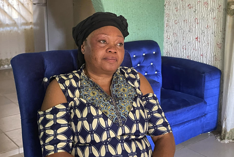 Mary Peter, mother of Jennifer Peter, who was kidnapped with others in her school by gunmen in March 2021, listens to a question during an interview with The Associated Press in Kaduna, Nigeria, Tuesday , March, 26, 2024. The gunmen who kidnapped Jennifer Peter and dozens of her peers from school in March 2021 returned months later to attack another school in her state in northwestern Nigeria. The second time, they seized over 100 children including Jennifer's 10-year-old cousin, Treasure, who was held captive for more than two years. (AP Photo/Chinedu Asadu)