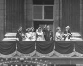 Not originally published in LIFE. Royals on the balcony of Buckingham Palace: (l. to r.) King George VI, Princess Margaret Rose, unidentified, Princess Elizabeth, Prince Philip, Queen Elizabeth and Queen Mother Mary after wedding of Elizabeth and Philip, Nov. 20, 1947. (William Sumits—Time & Life Pictures/Getty Images) <br> <br> <a href="http://life.time.com/history/queen-elizabeth-and-prince-philip-photos-from-the-royal-wedding-1947/#1" rel="nofollow noopener" target="_blank" data-ylk="slk:Click here to see the full collection at LIFE.com;elm:context_link;itc:0;sec:content-canvas" class="link ">Click here to see the full collection at LIFE.com</a>