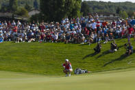 Minjee Lee, of Australia lines up a putt during the last round of the Evian Championship women's golf tournament in Evian, eastern France, Sunday, July 25, 2021. (AP Photo)