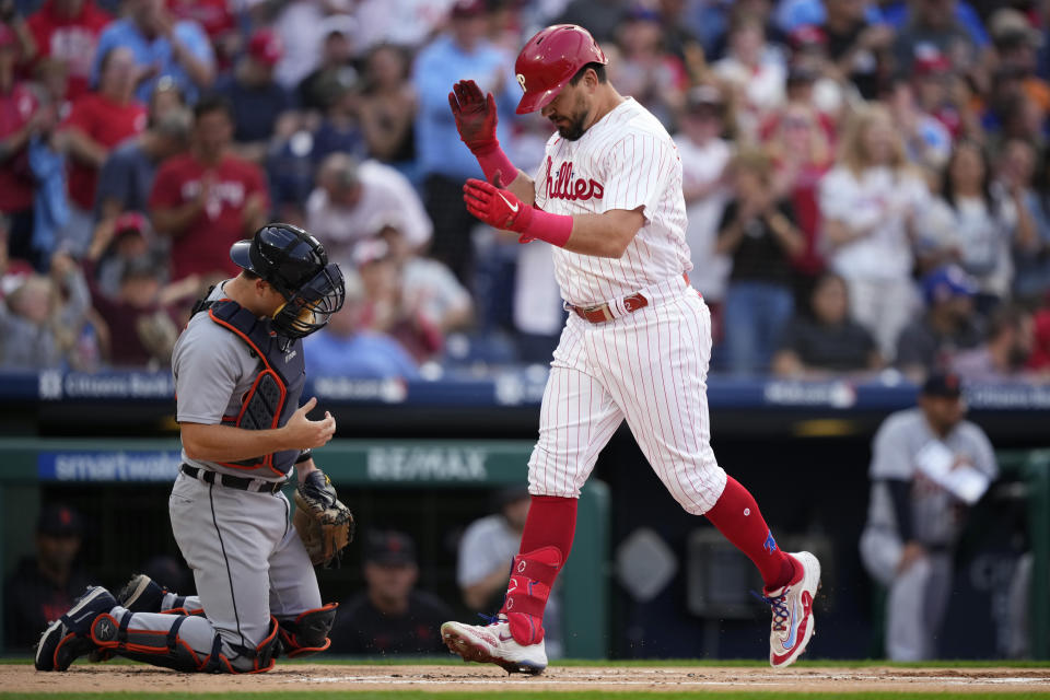Philadelphia Phillies' Kyle Schwarber, right, celebrates after hitting a home run against Detroit Tigers pitcher Tyler Alexander during the first inning of a baseball game, Tuesday, June 6, 2023, in Philadelphia. (AP Photo/Matt Slocum)