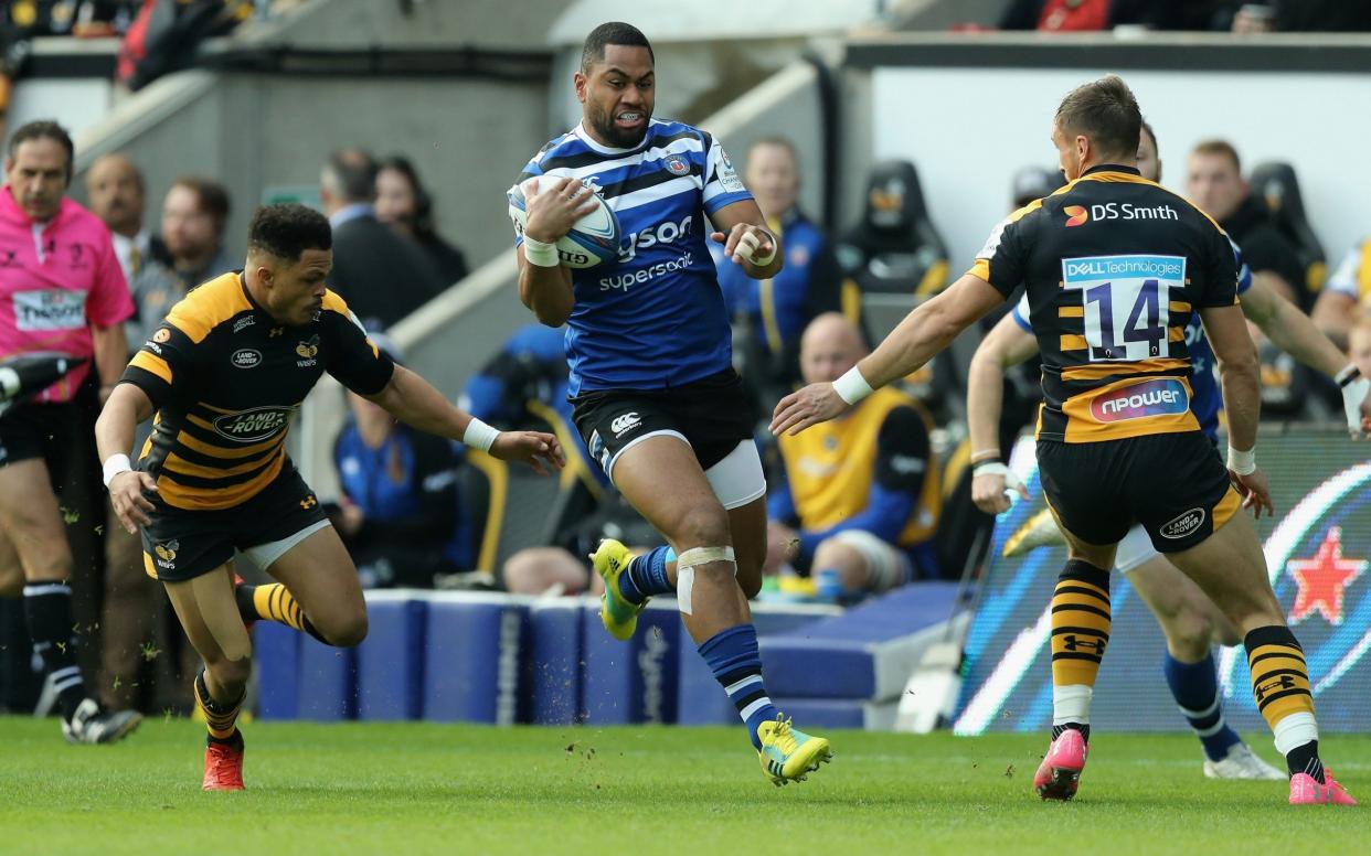 Bath wing Joe Cokanasiga charges down the flank into Wasps defenders - Getty Images Europe