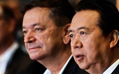 Interpol vice president Alexander Prokopchuk and and Meng Hongwei pictured in 2017 - Credit: ROSLAN RAHMAN/AFP/Getty Images