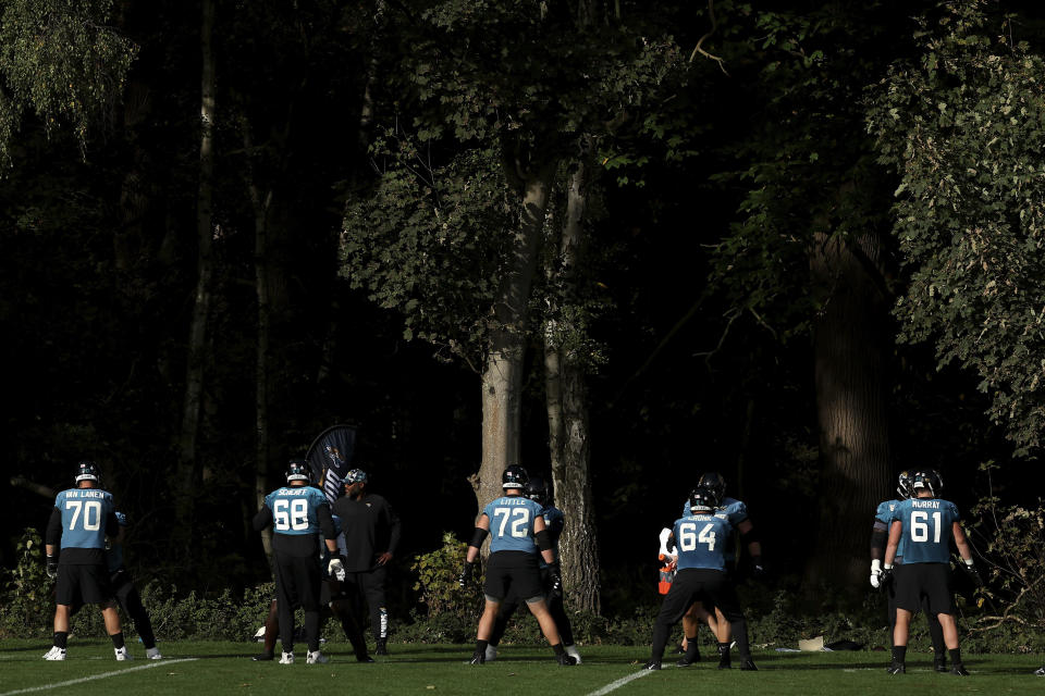 Jacksonville Jaguars players attend a practice session at The Grove in Watford near London, Friday, Oct. 28, 2022. The Jacksonville Jaguars will take on the Denver Broncos in an NFL regular season game on Sunday at Wembley Stadium in London. (AP Photo/Ian Walton)