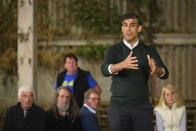 British Prime Minister Rishi Sunak speaks to farmers as he campaigns on a farm near Barnstaple, England, Tuesday June 18, 2024. (Leon Neal, Pool Photo via AP)