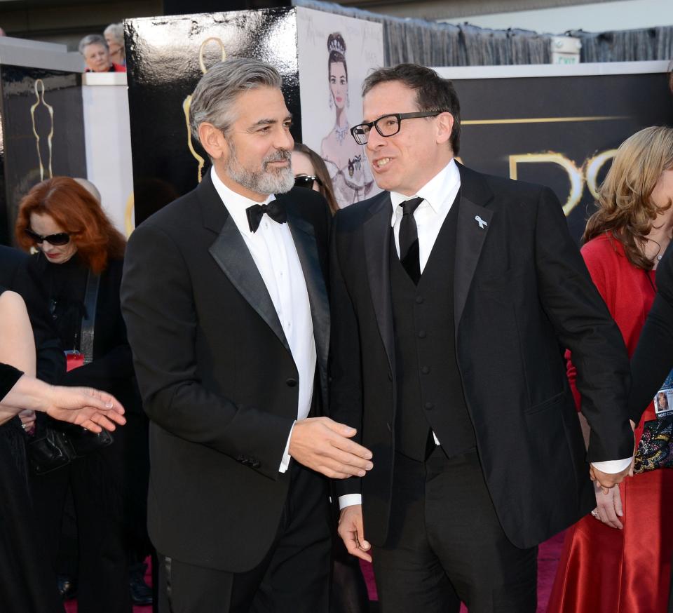 Actor George Clooney and director David O. Russell arrive at the Oscars at Hollywood and Highland Center on February 24, 2013 in Hollywood, California