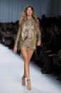 Bundchen wore metallic shorts, blazer, and top from the spring/summer 2012 collection on the Givenchy runway.