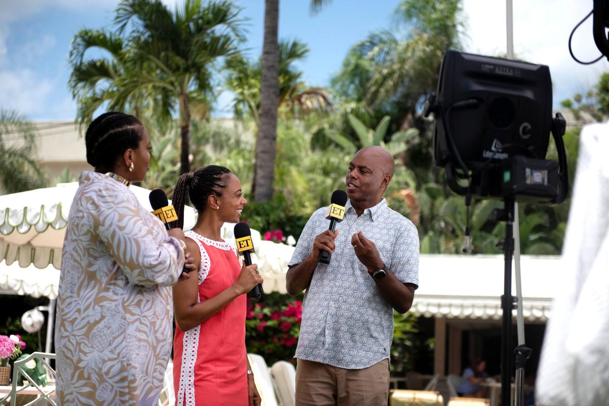 "Entertainment Tonight" host Kevin Frazier (right) chats with co-host Nischelle Turner (center) and Amber Chardae Robinson of "Palm Royale" during a taping for the series at The Colony Hotel as part of the show's Palm Beach Week, on July 25 in Palm Beach.