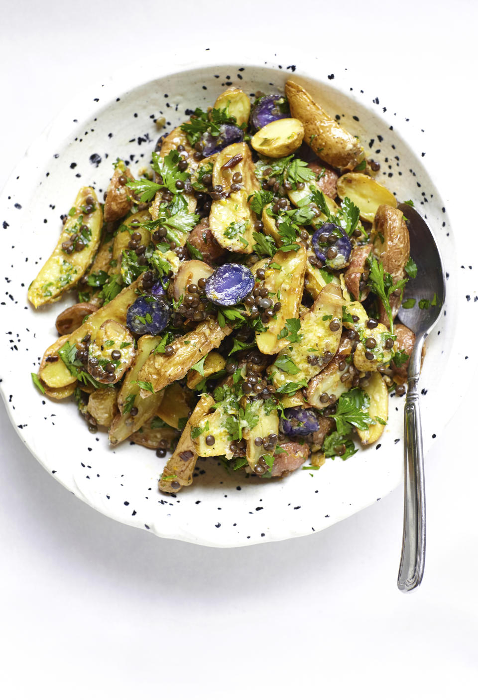 This image shows a recipe for potato salad with leeks, lentils and a citrus vinaigrette. (Patricia Bannan via AP)