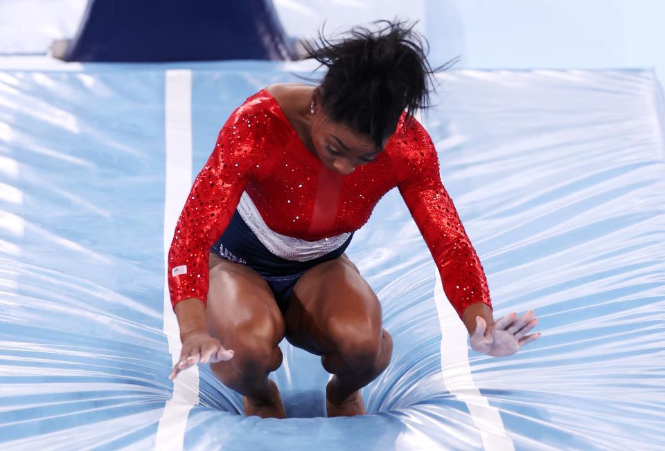 Simone Biles stumbles after trying to perform a move known as the Amanar (Getty)