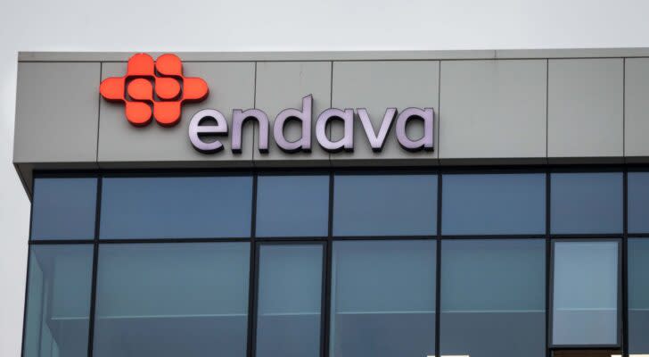 The logo for Endava (DAVA) displayed on an office building.