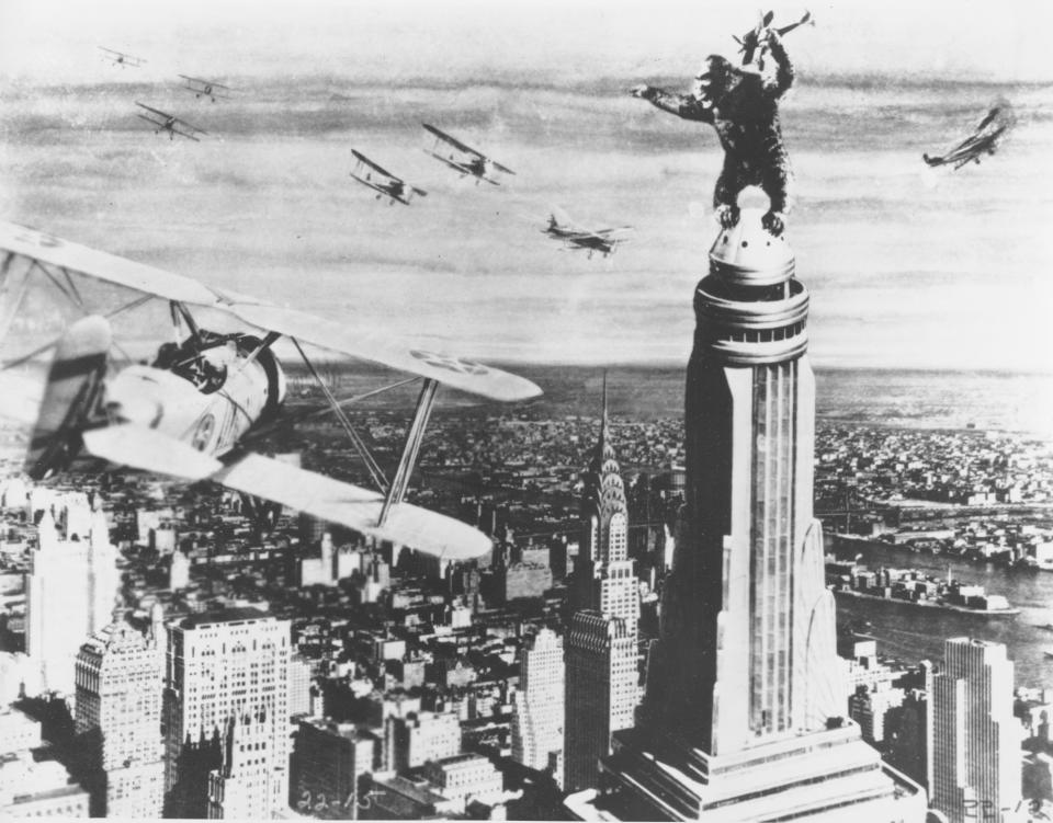 FILE - In this 1933 file photo released by RKO Radio Pictures, King Kong stands atop New York's Empire State Building as he holds an airplane during an attack by fighter planes in a scene from "King Kong." (AP Photo/RKO Radio Pictures)