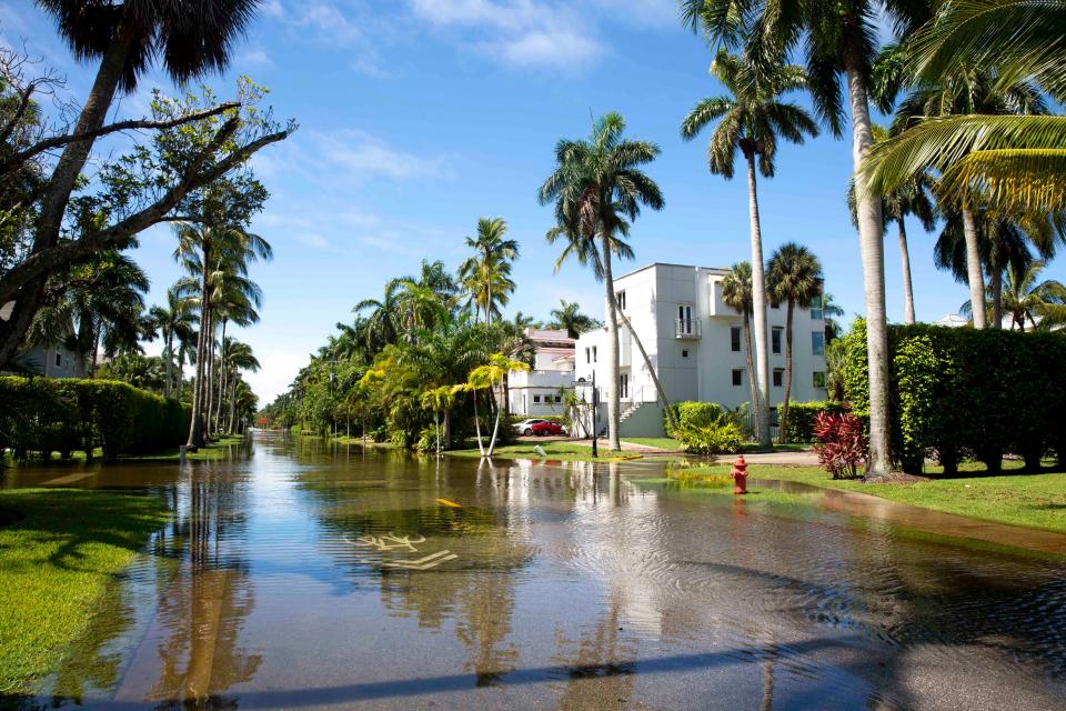 Gulf Shore Blvd S near 13th Ave 3 is blocked off because of flooding after a tropical system drenched Naples on Friday and left some streets flooded, Saturday, June 4, 2022, as 3.04 inches of rain was recorded on Friday at Naples Airport in Naples, Fla.The record for June 3 is 6.49 inches in 1977.