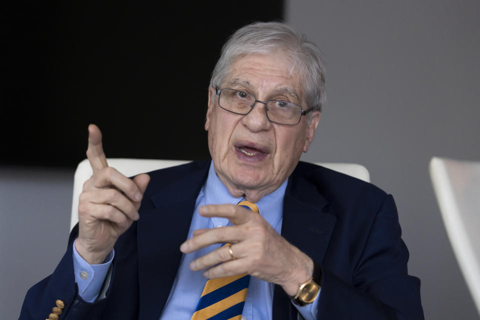 Attorney Joel Finkelstein, who was present at the signing of the Voting Rights Act of 1965, reflects on that historic event and how the legislation was born, during an interview with The Associated Press at his office in Rockville, Md., April 13, 2023. Finkelstein began his career as a young lawyer in the Civil Rights Division of the Department of Justice in 1964. (AP Photo/J. Scott Applewhite)