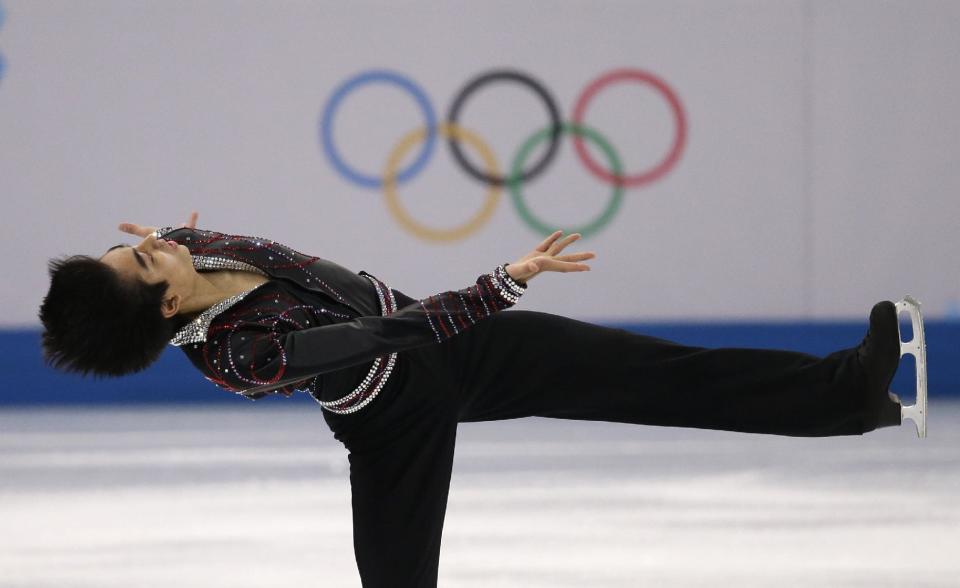 Michael Christian Martinez of the Philippines competes in the men's free skate figure skating final at the Iceberg Skating Palace during the 2014 Winter Olympics, Friday, Feb. 14, 2014, in Sochi, Russia. (AP Photo/Darron Cummings)