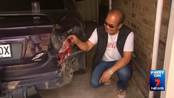 One of the stray tyres smashed straight into this parked car, damaging the tail light and the rear bumper. Photo: 7News